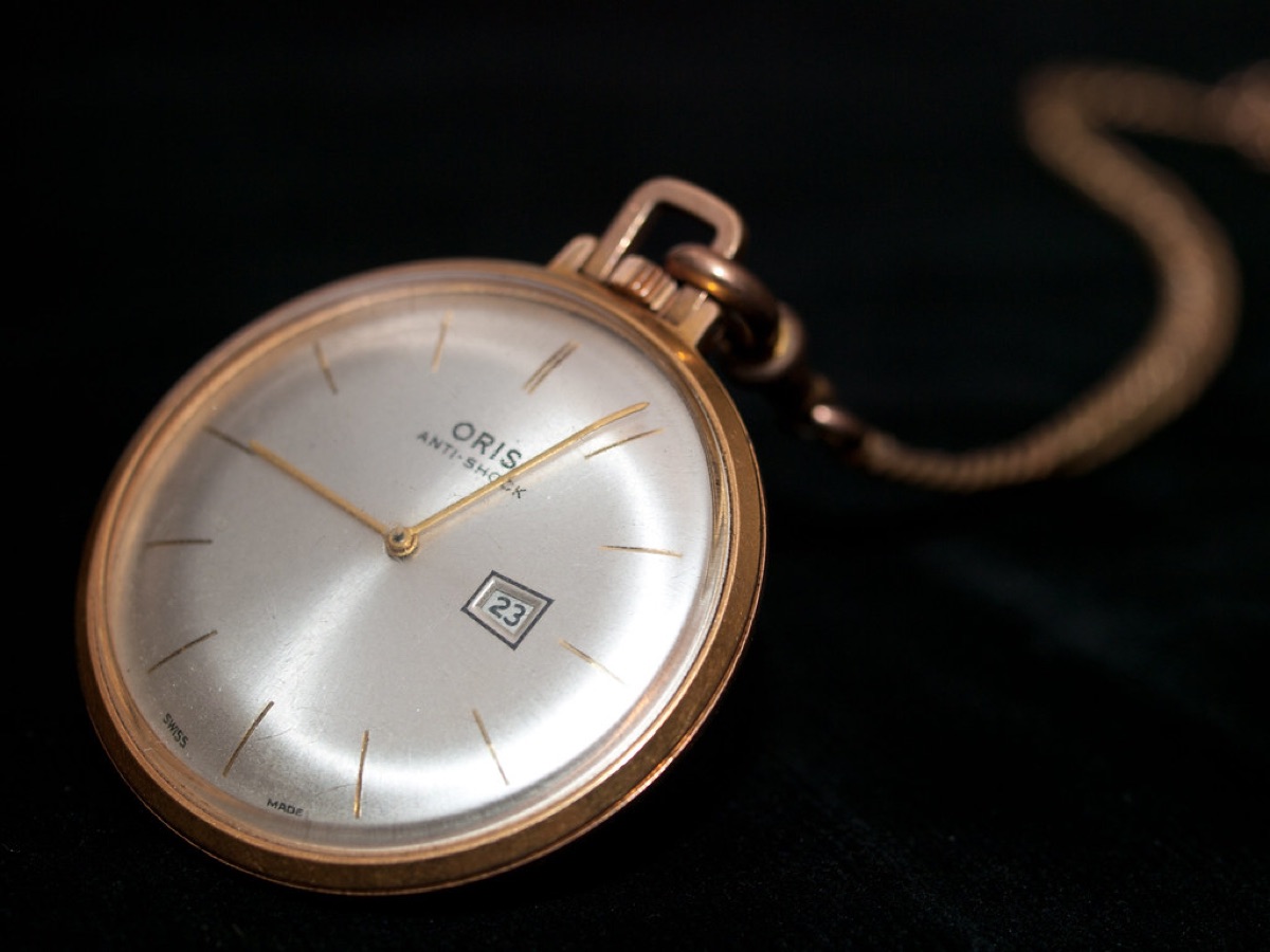 Gold watch on a chain